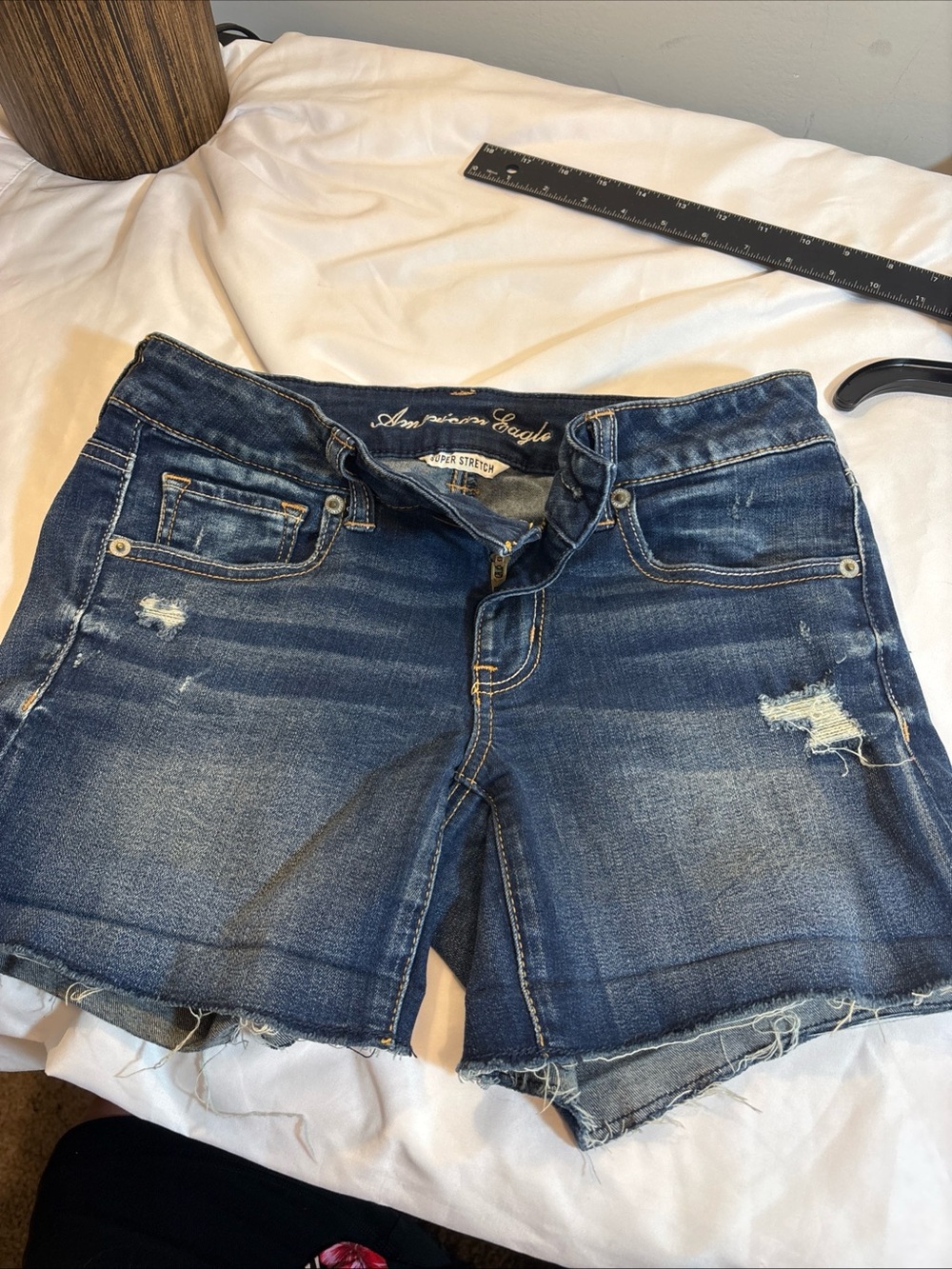 American Eagle Outfitters Women's Dark Blue Distressed Denim Shorts. 627